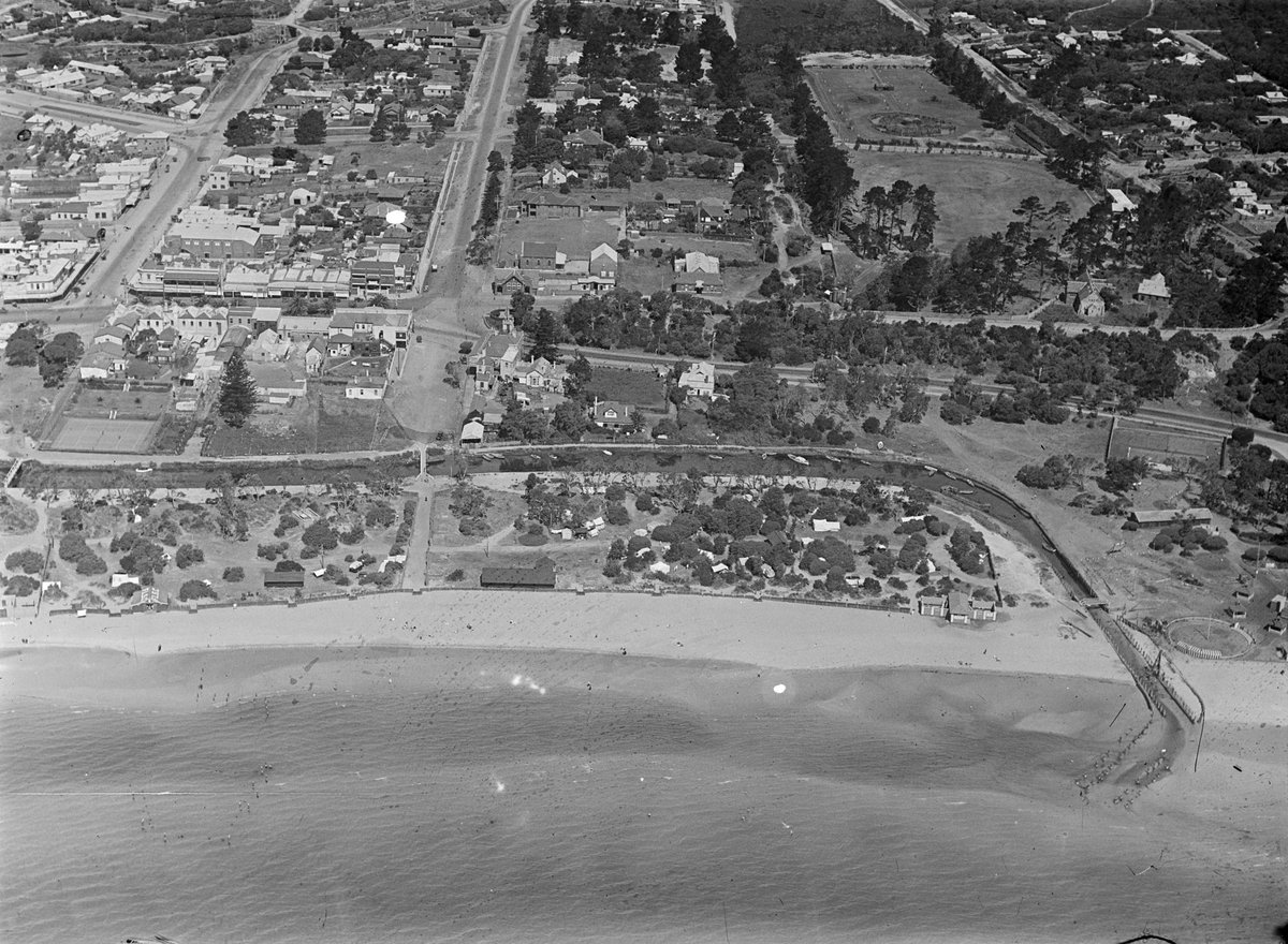 Foreshore and part of township, possibly at Frankston, shed at beach has FLSC on roof (c. 1946)