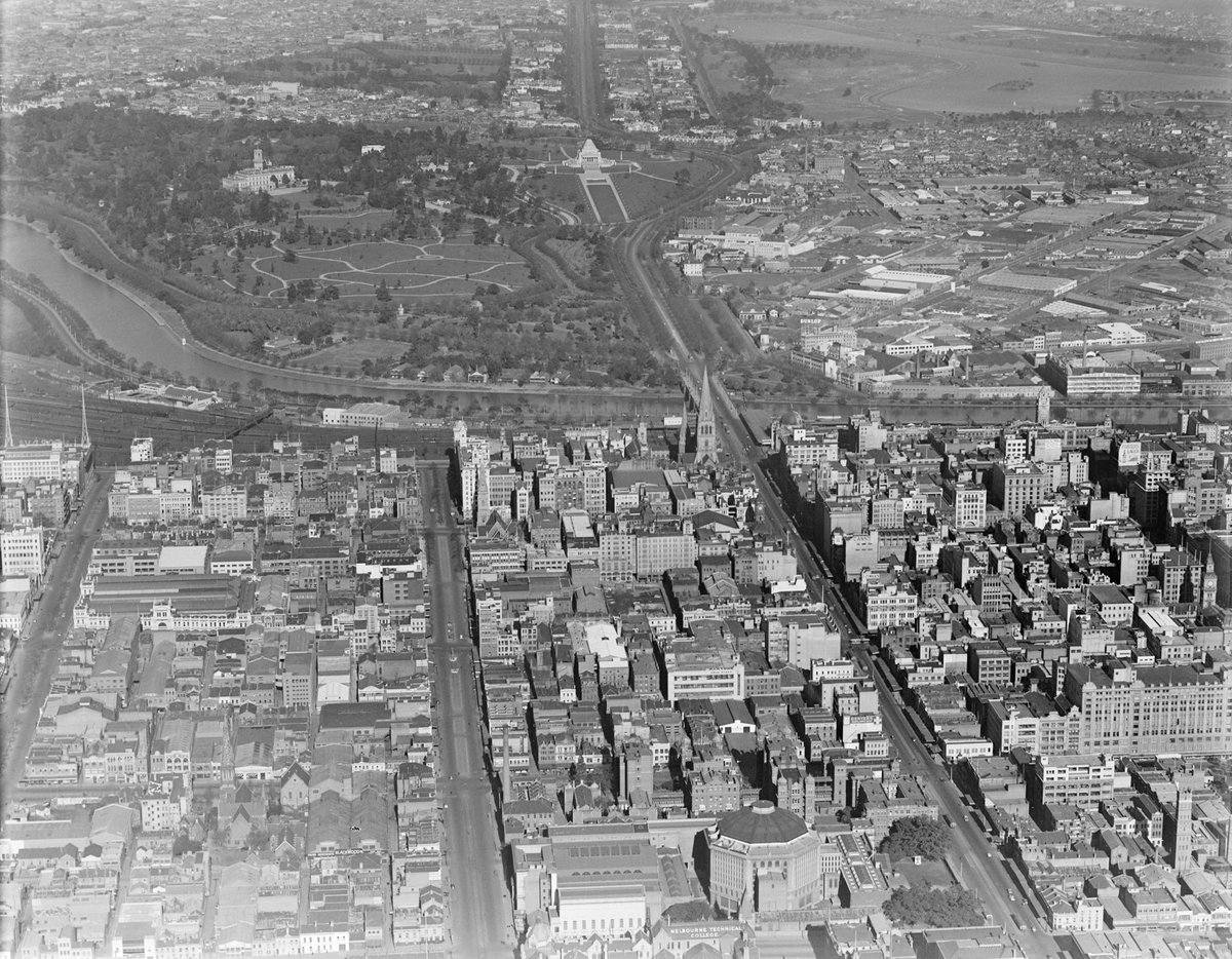 [Aerial view of Melbourne from State Library of Victoria to Gardens and Shrine of Remembrance], Melbourne City (1938)