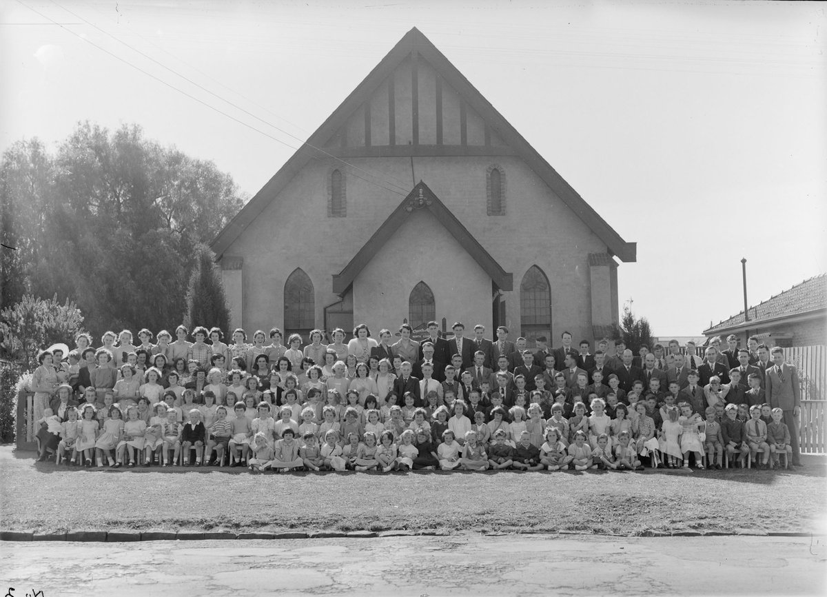 Large group of men, women and children outside Church of Christ, Berry Street, North Essendon, Essendon North (1951?)