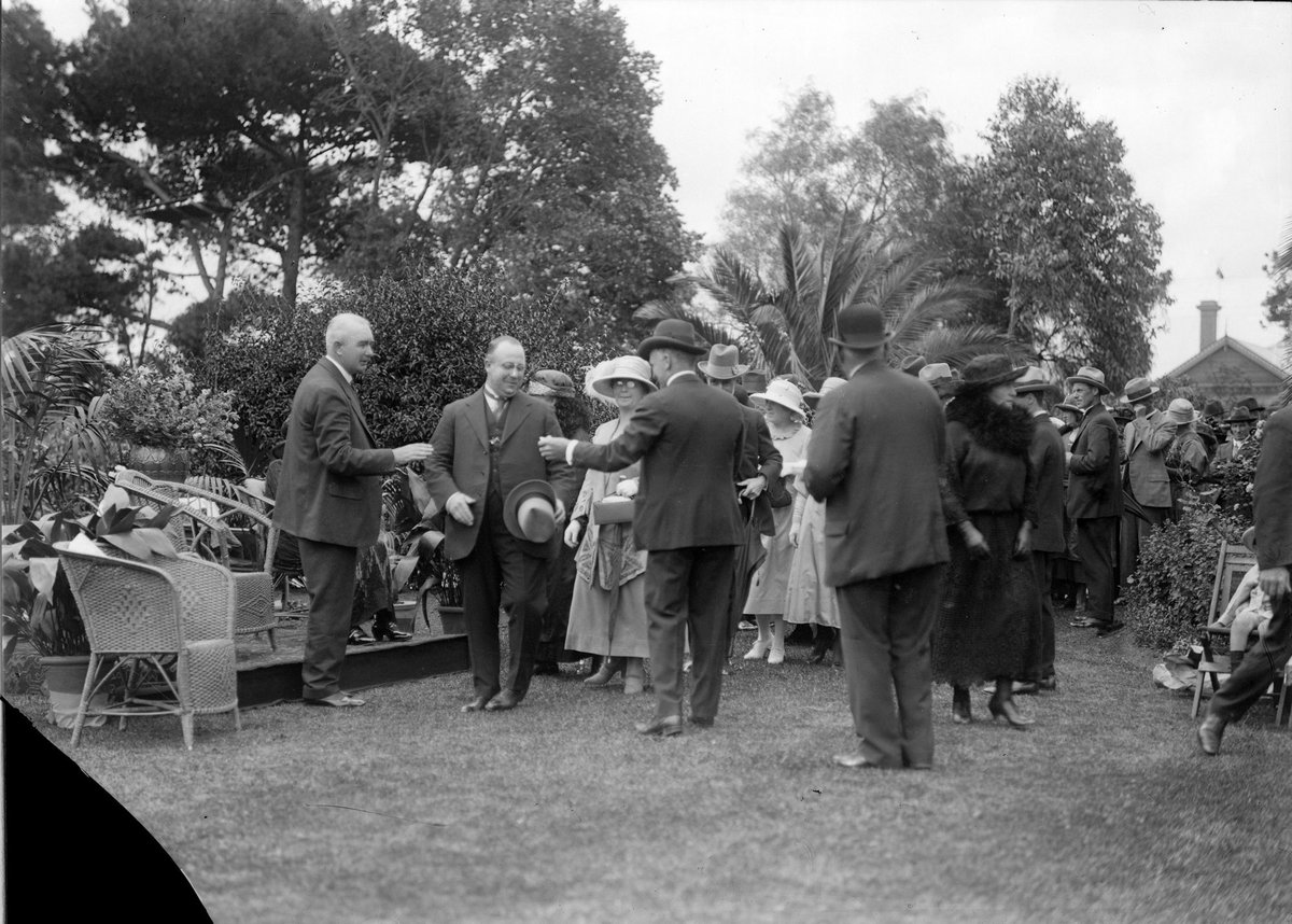 Mayor and Mayoress Liston greeting guests at the garden party, Williamstown Botanic Gardens, Melbourne City (1922)