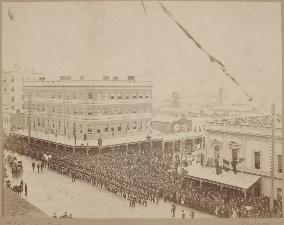 Corner of Bourke and Spring Streets, at the opening of Parliament?, Melbourne City (c. 1884)