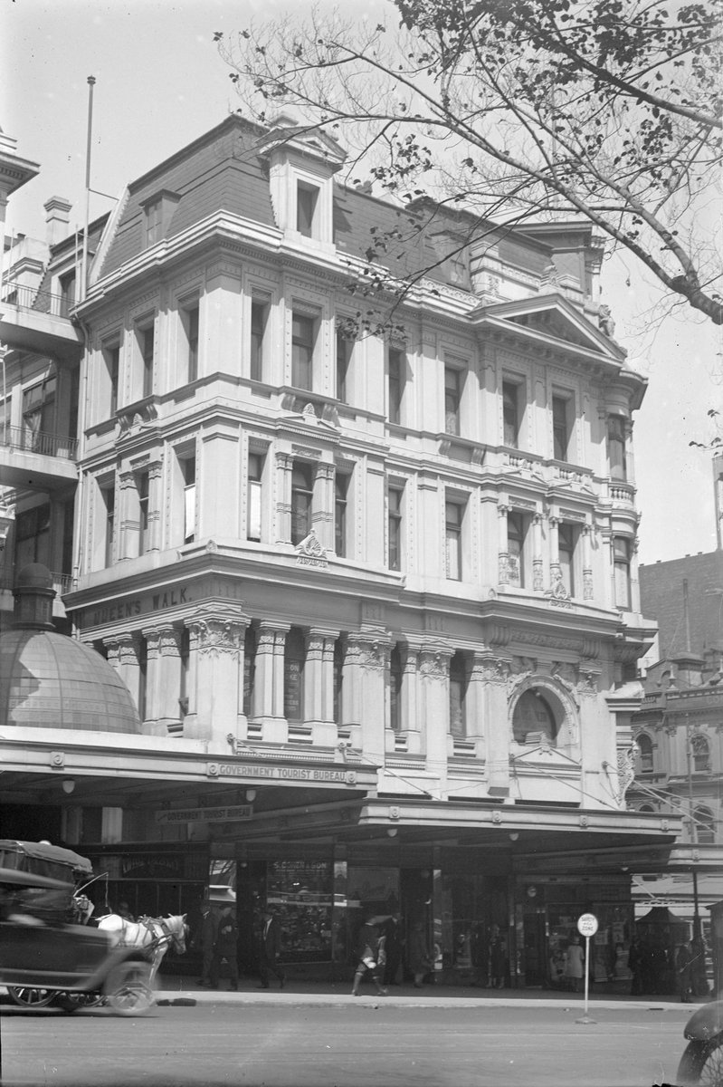 Victoria Buildings, 211 Collins St. showing entrance to Queen's Walk, S. Cohen and Son, tobacconists, and Government Tourist Bureau, Melbourne City (c. 1920)