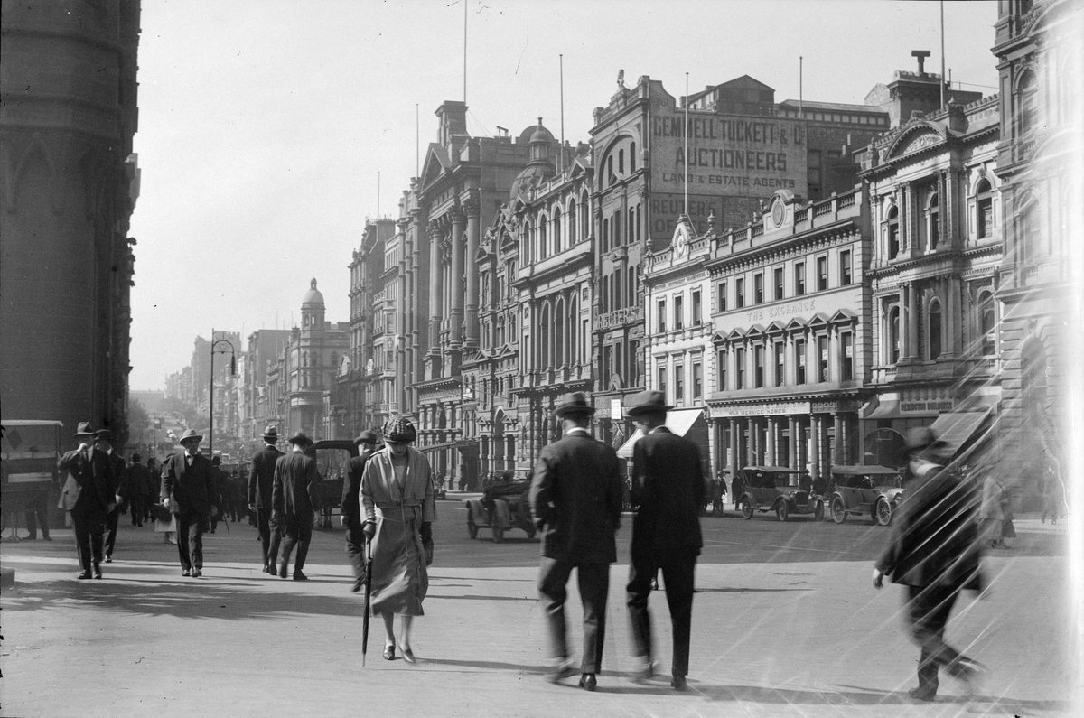 Oblique view of the south side of 347-377 Collins Street between Queen and Elizabeth Streets, Melbourne City (c. 1920)
