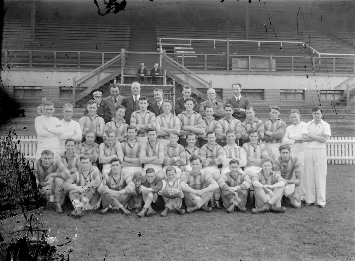 North Melbourne (VFL) Thirds premiership team in front of grandstand, Arden Street (1946)