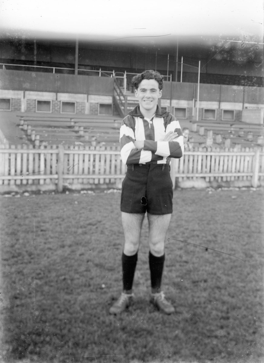 Thorold Merrett standing on oval, Victoria Park, Collingwood (c. 1950)
