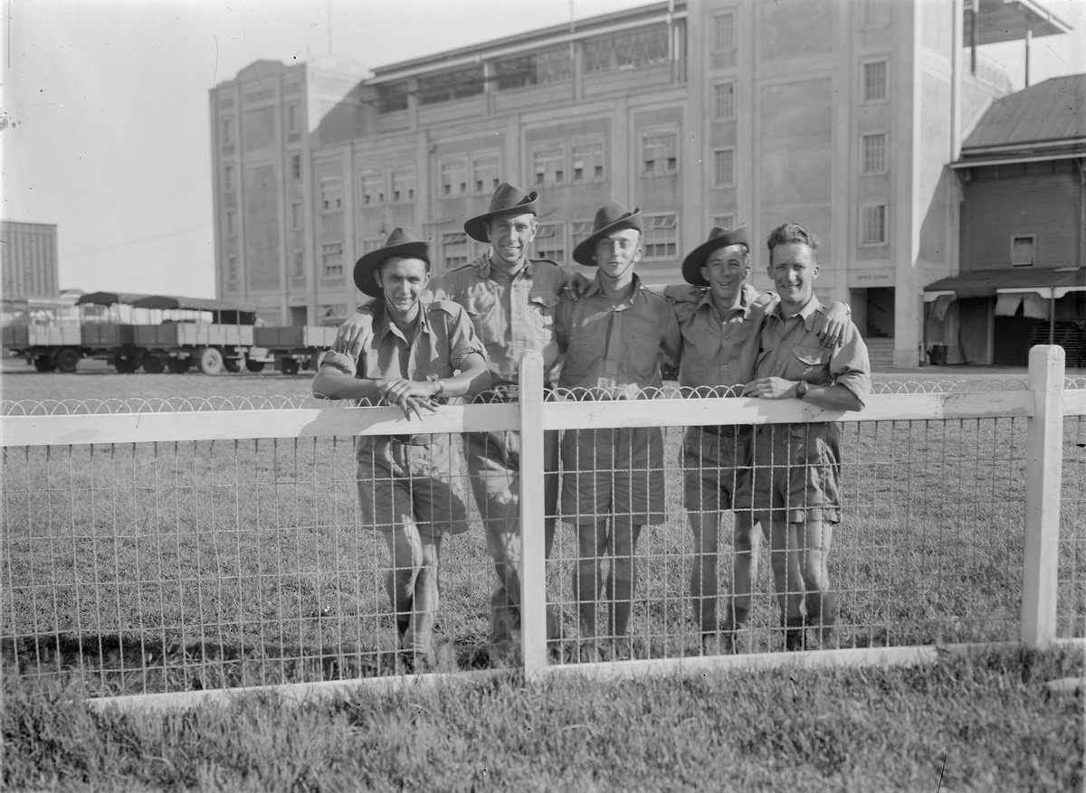 Australian soldiers behind a fence, Dandenong Camp (c. 1941)