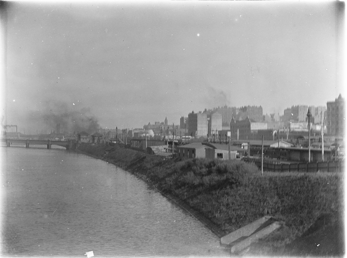 Yarra river below Spencer Street, looking East, Melbourne City (c. 1910)