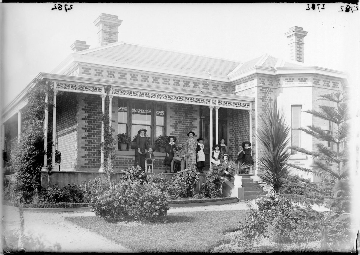 Family posed on verandah of house, probably in Melbourne (1890–1910)