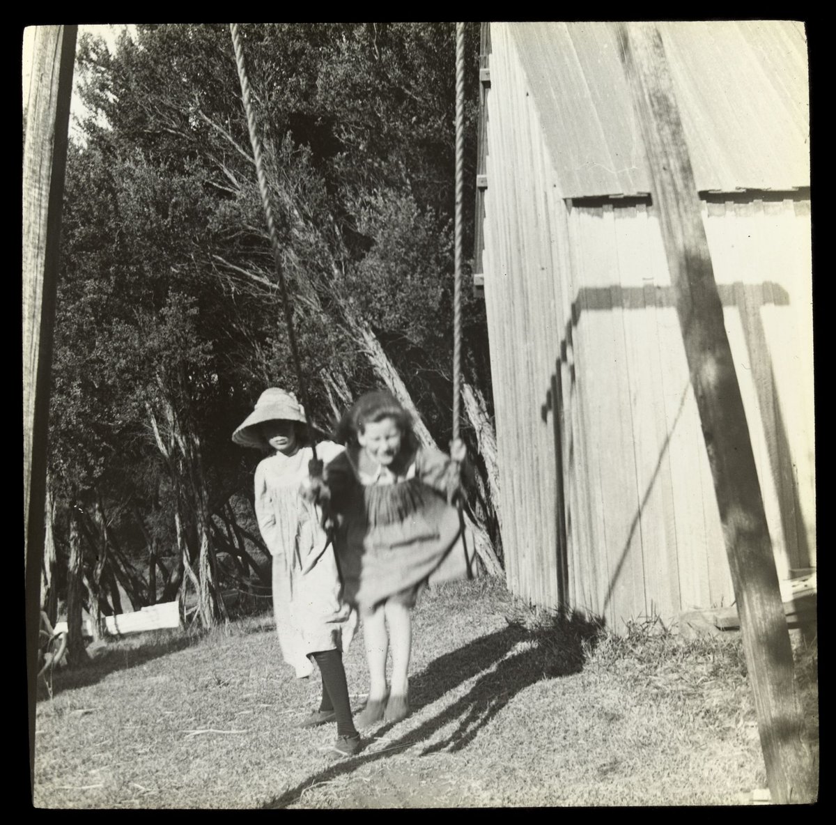 Gertrude and Clare on swing - "Ivanhoe" 1909 [Sorrento] [slide]