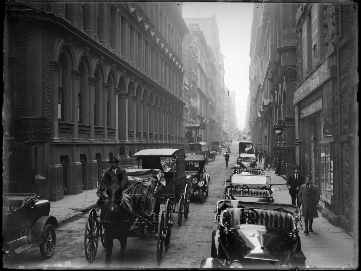 Motor vehicles lining Flinders Lane, Melbourne, Vic, Melbourne City (1891–1914)
