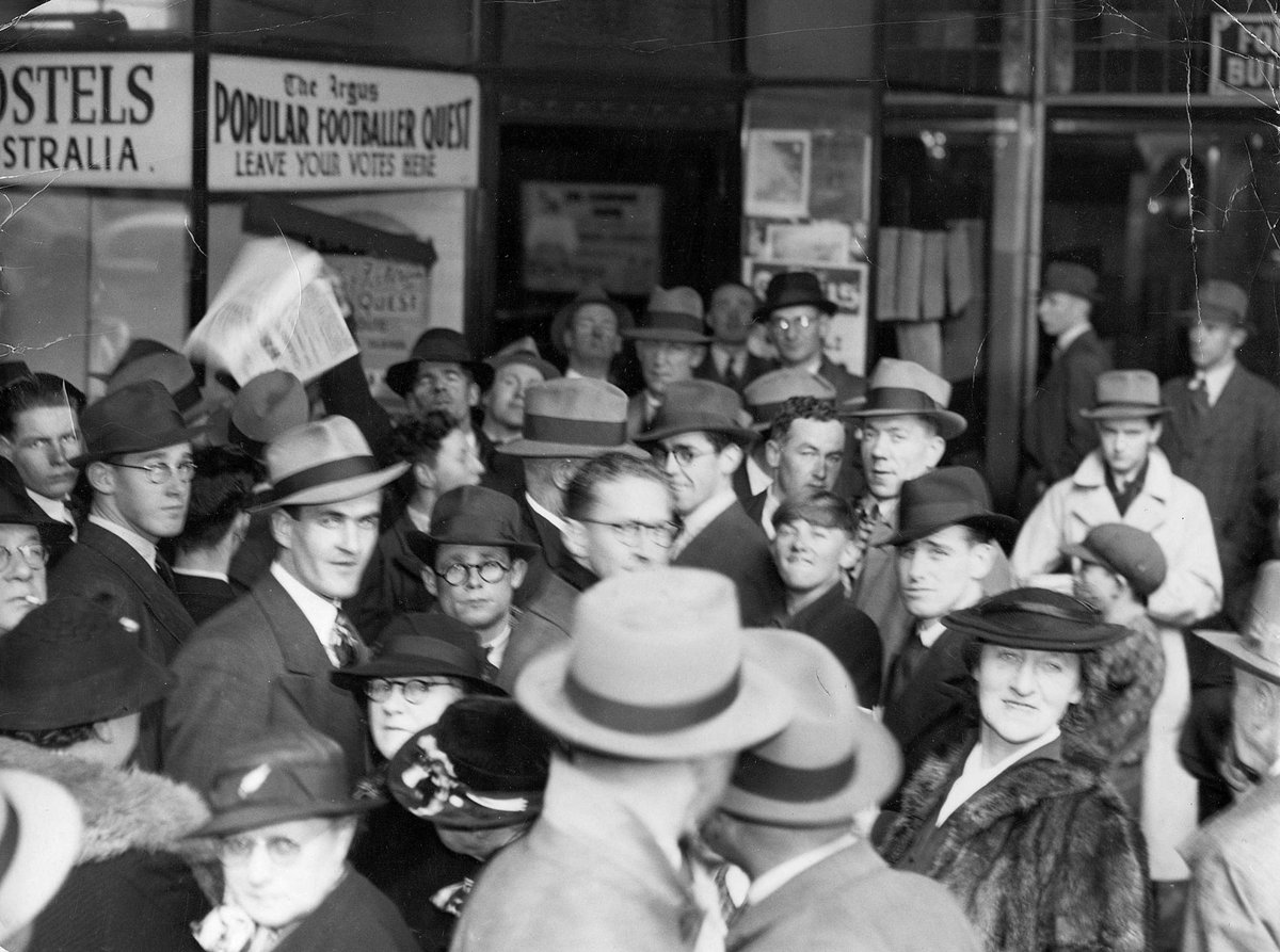 Crowds in Collins St. seeking latest war news, Melbourne City (c. 1939)