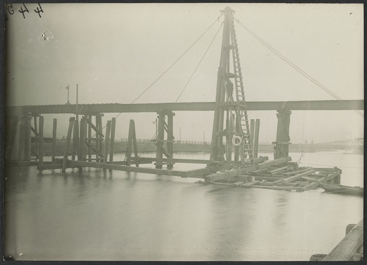 South Kensington to West Footscray, pile-driving, temporary bridge for use in erection of 175' span, in bridge over Maribyrnong River (1927)