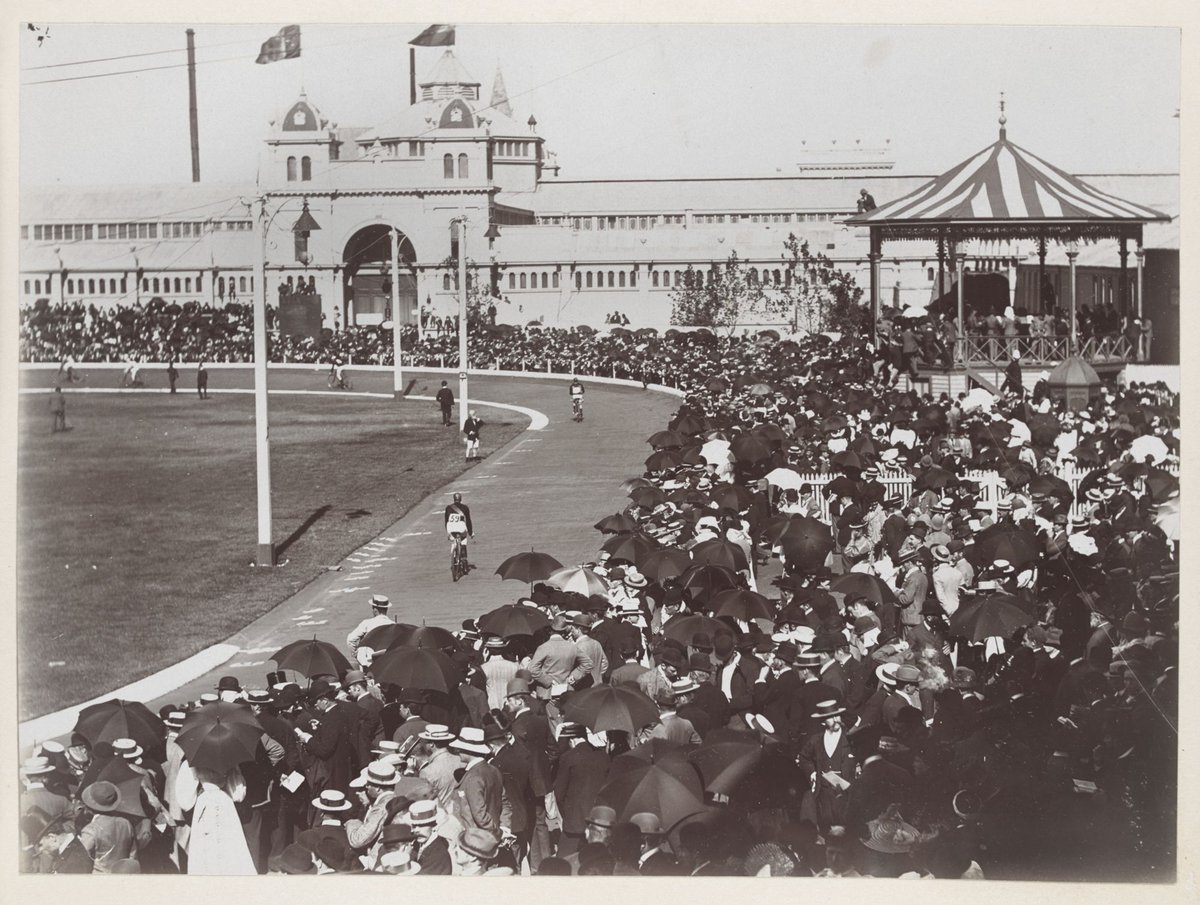 Bicycle race outside the Royal Exhibition Building, Melbourne, Carlton (1885–90)