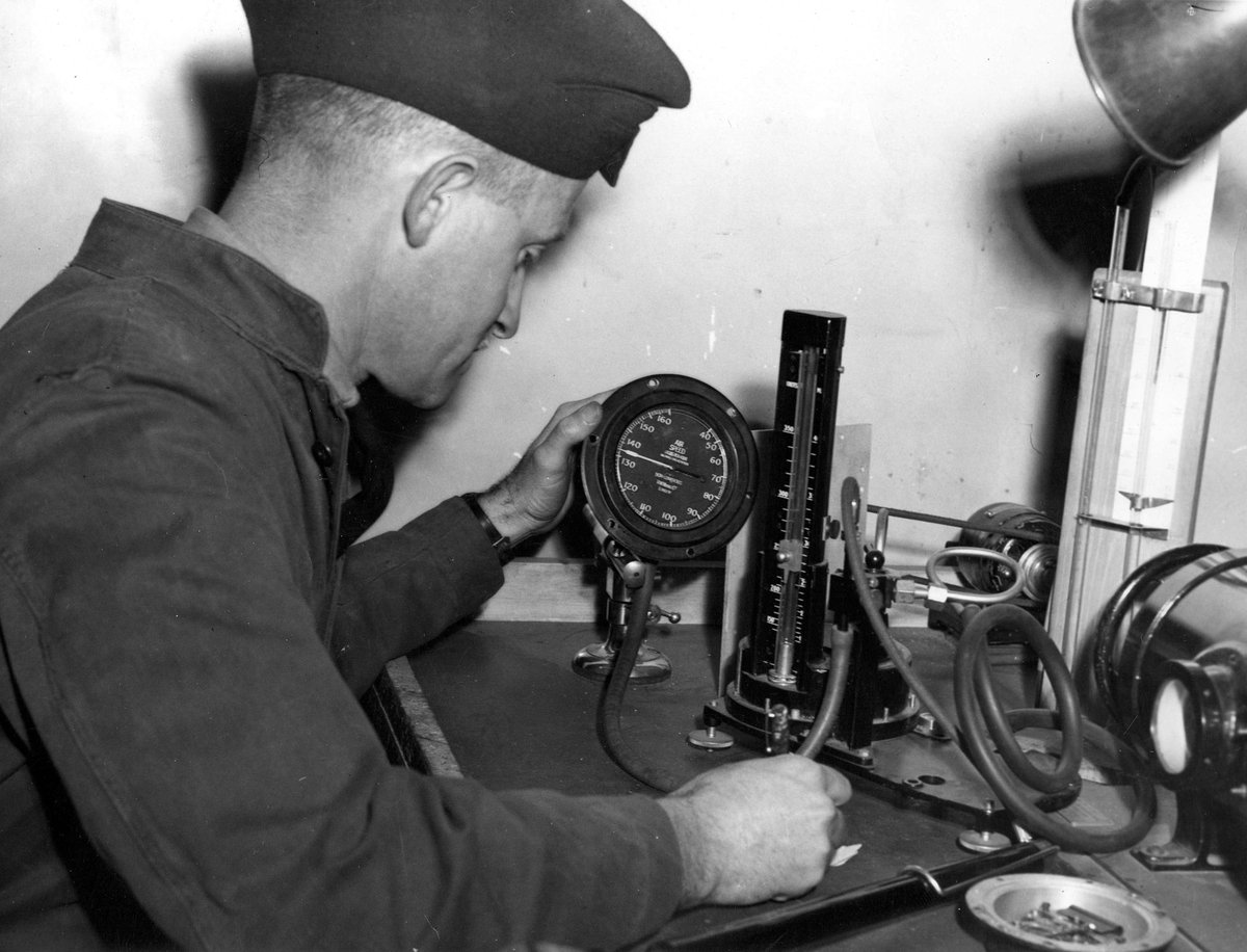 Air Force trainee calibrating on an air speed indicator [at Melbourne Technical College] (c. 1941)
