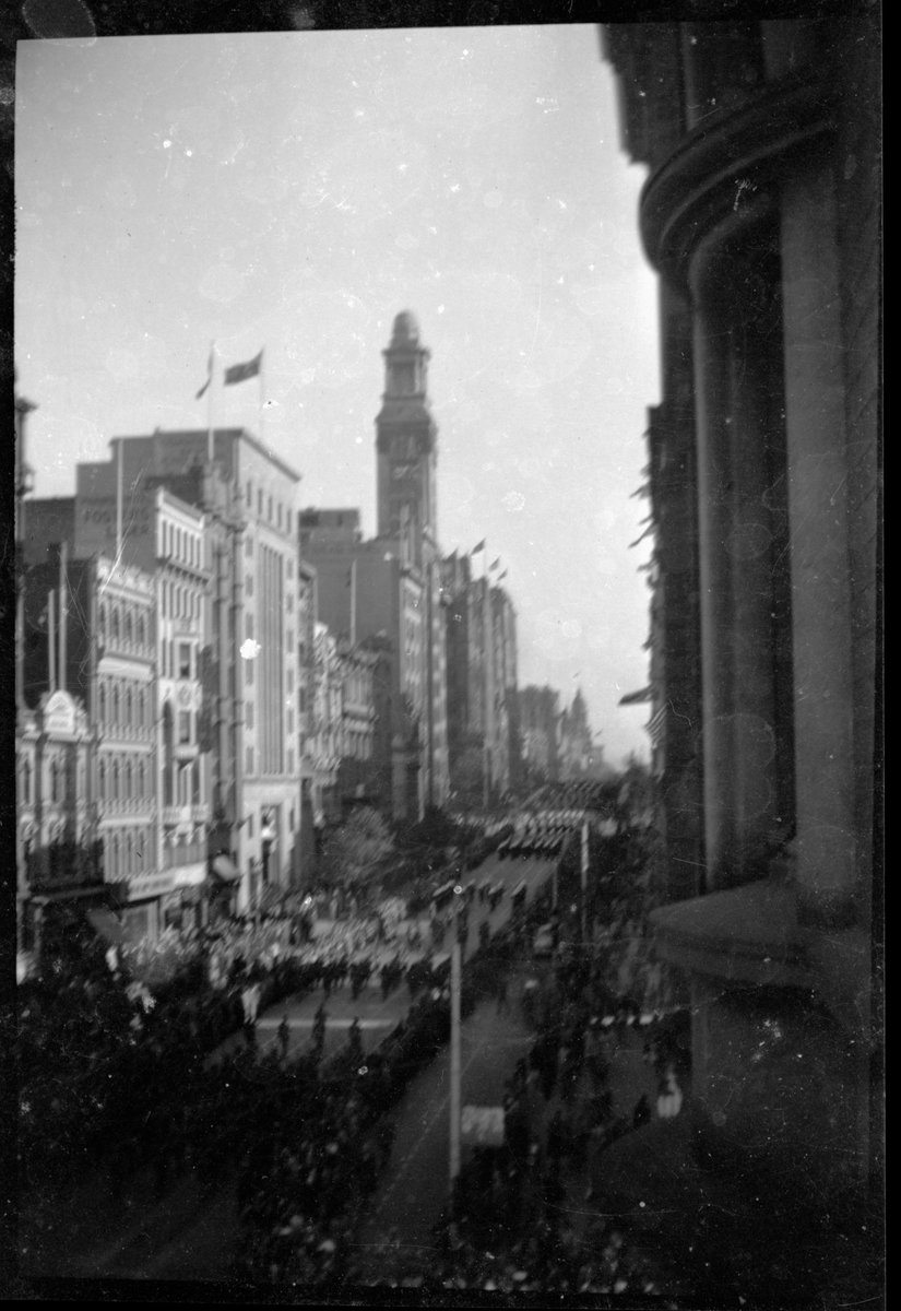 Parade and crowds in Collins Street, Melbourne, Victoria, Melbourne City (1940s)