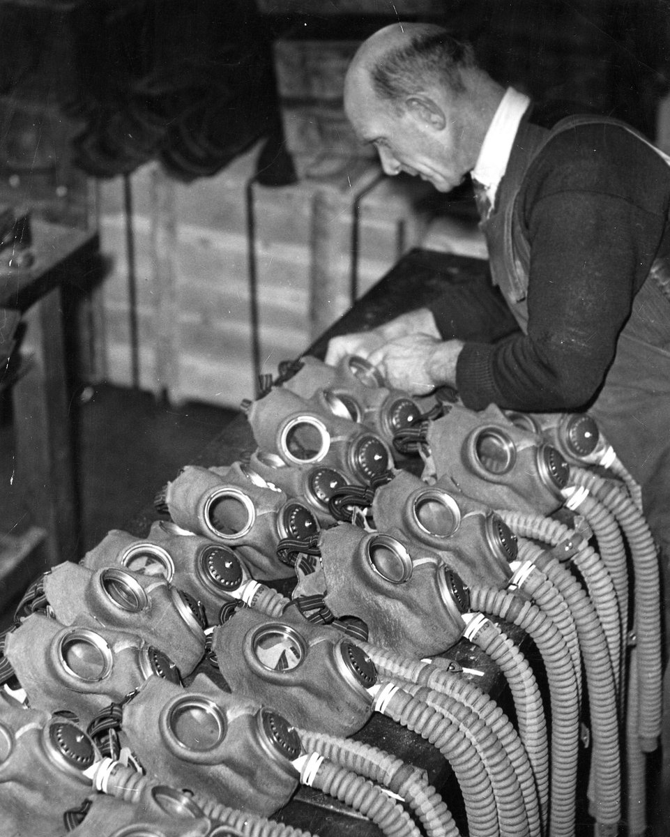 AUSTRALIAN-MADE gas masks ready for testing at the Commonwealth Ordnance Factory, Maribyrnong (c. 1938)