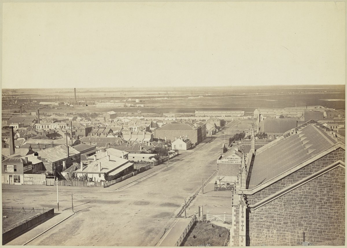 Shows Lonsdale Street looking West from William Street : from the tower of Dr Fitzgerald's residence Lonsdale Street West, Melbourne City (1869)