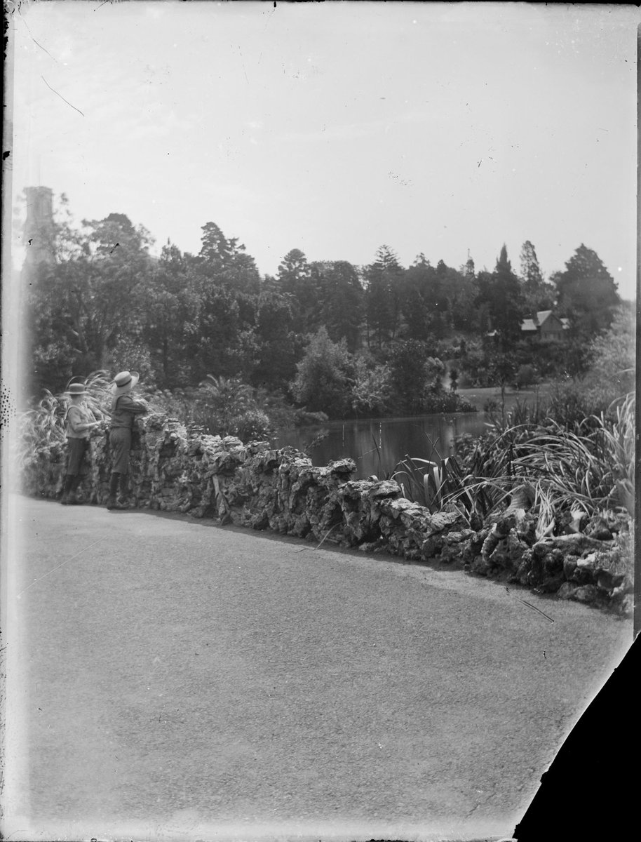 Two young boys beside a lake, possibly Royal Botanical Gardens, Melbourne, Melbourne City (1900)