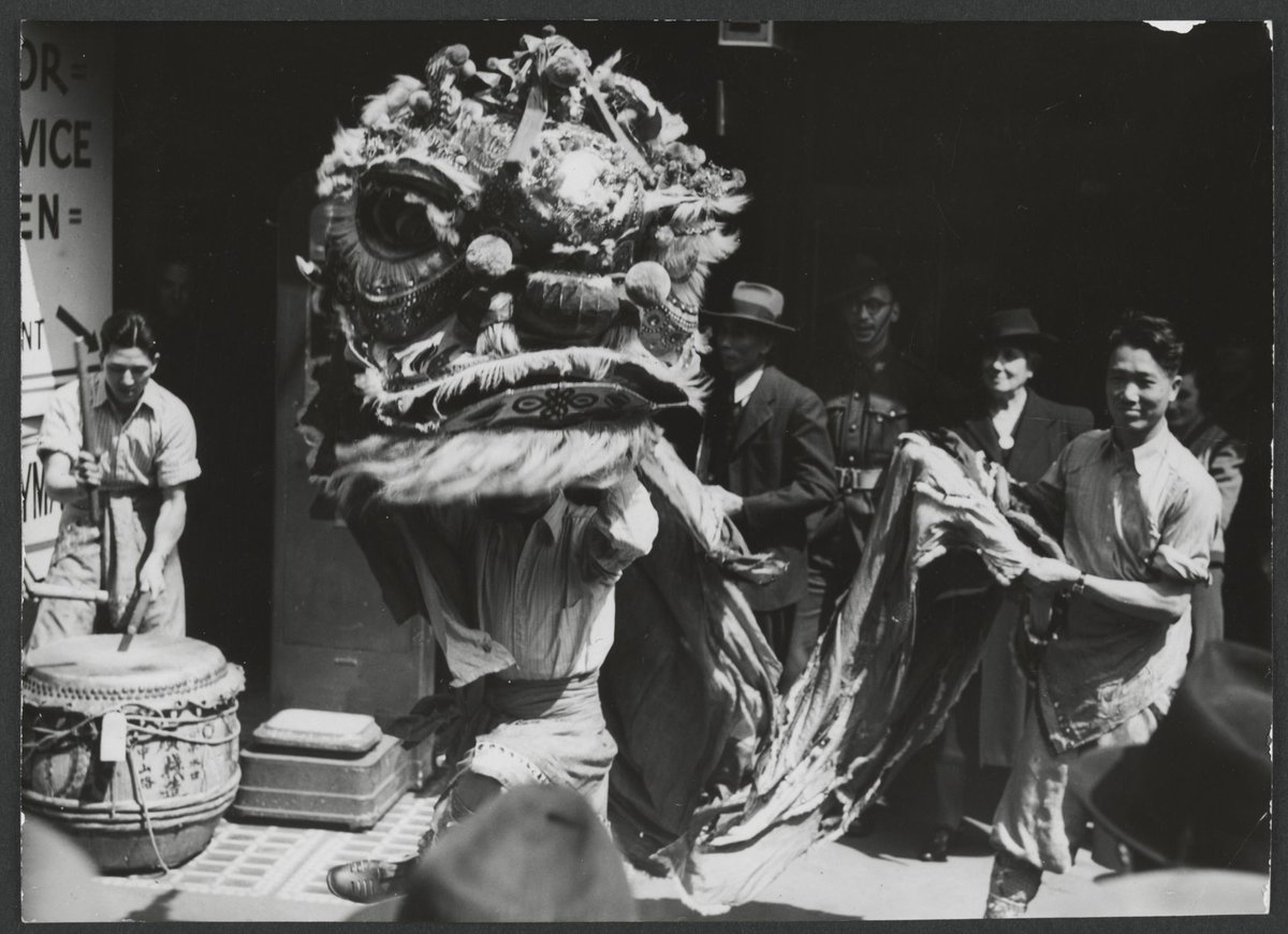 Chinese lion and drays in city of Melbourne to promote the Chinese Lion Carnival, Melbourne City (c. 1943)