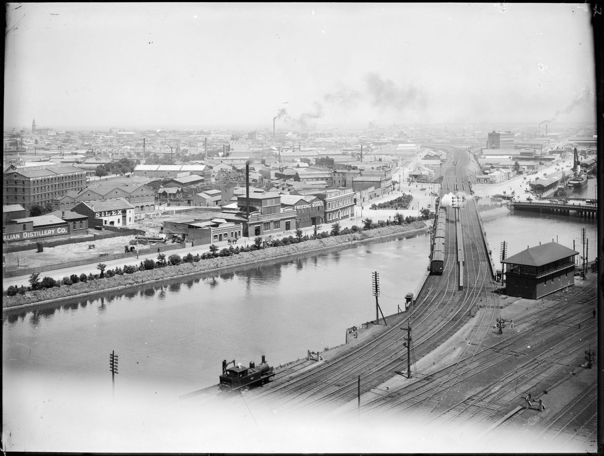 [Elevated view across Yarra River along railway bridge] (1893–1914)