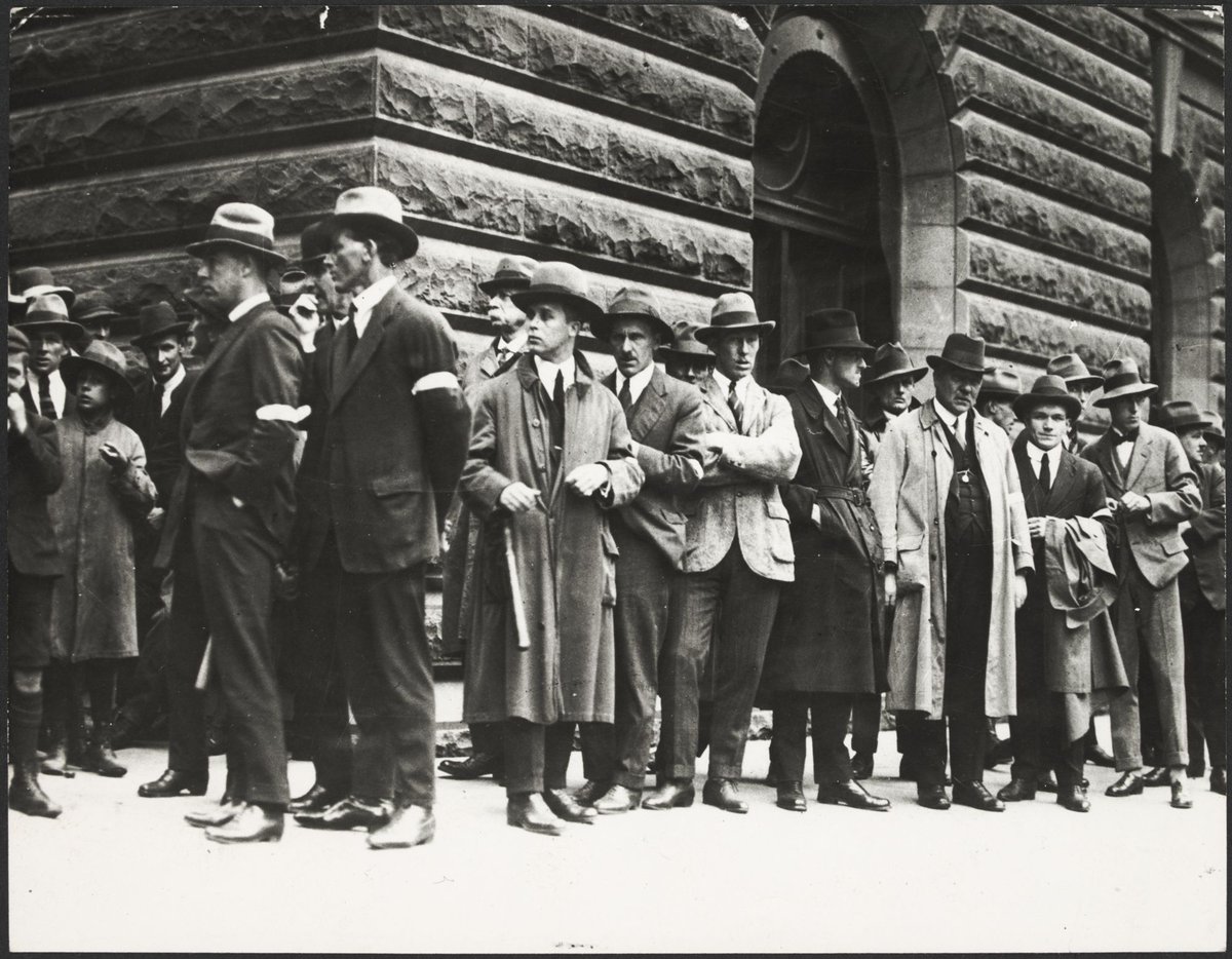 A queue of men lining up outside the Melbourne Town Hall to volunteer as special constables during the Police Strike,, Melbourne City (1923)