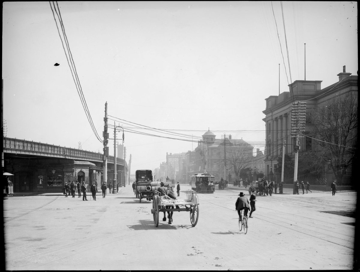[Looking west along Flinders Street, railway bridge on left], Melbourne City (1891–1914)