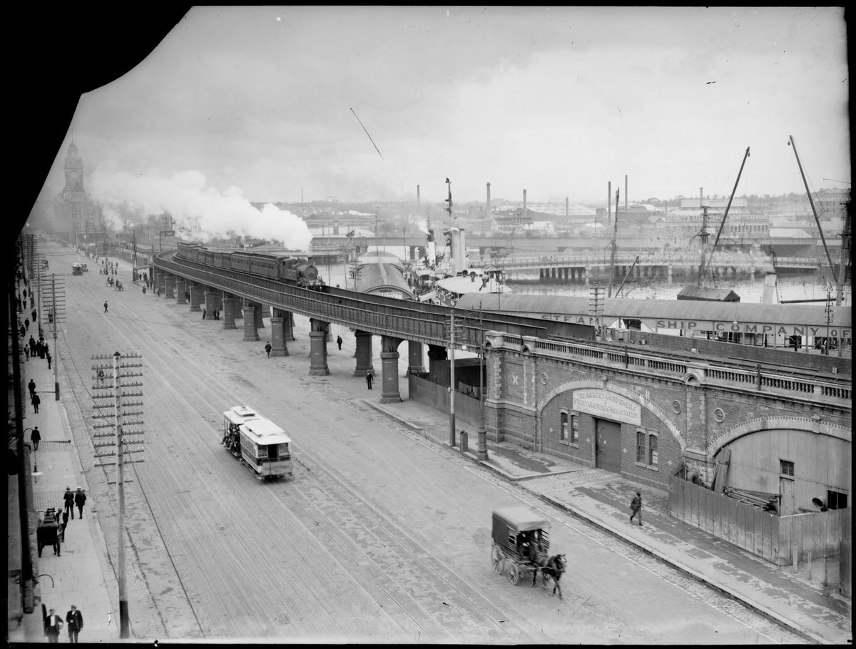 [Looking east along Flinders Street with railway bridge on right], Melbourne City (c. 1911)