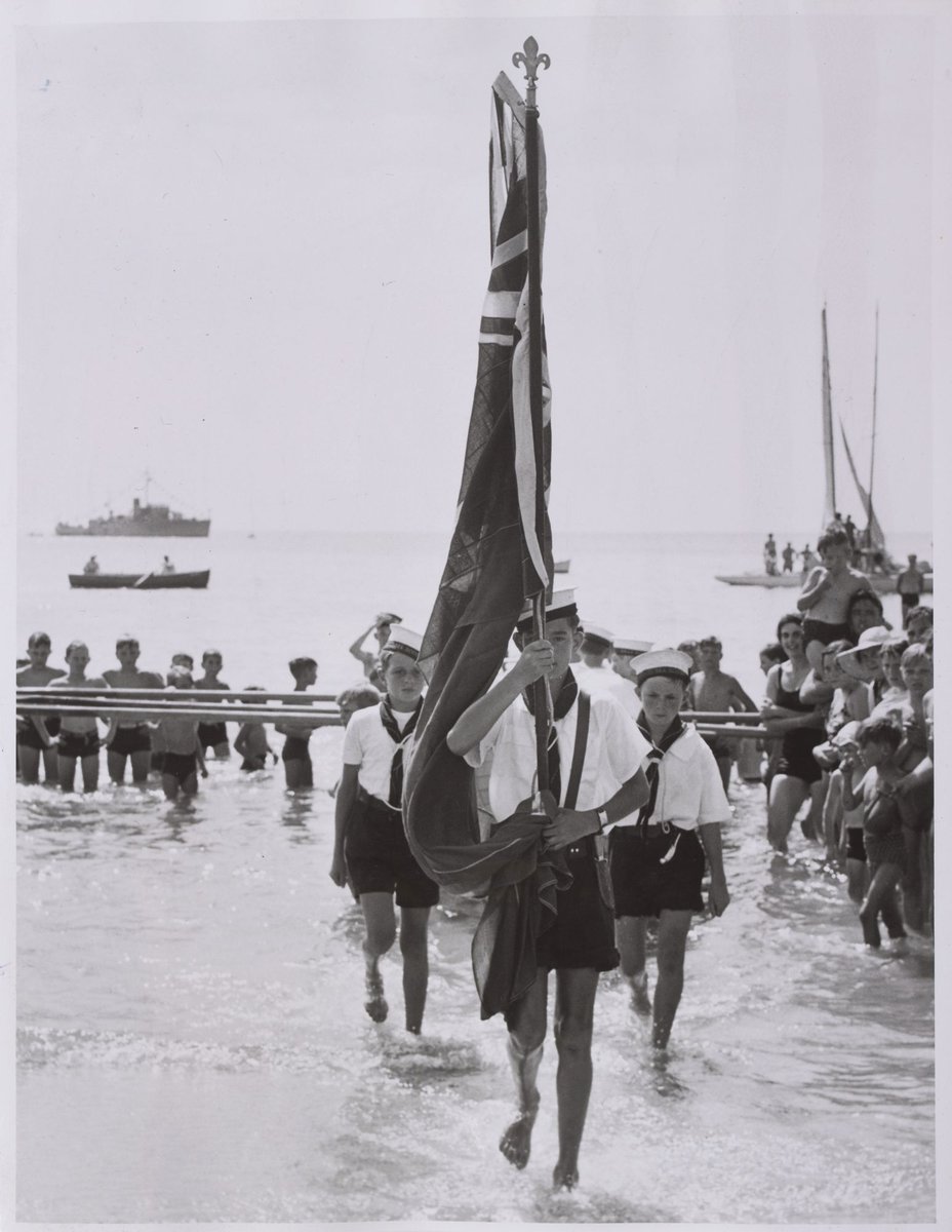 Sea Scouts carry the Australian flag at the Australia Day ceremony at Frankston (c. 1953)