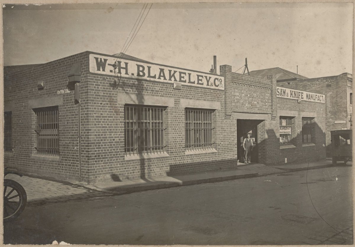 [13-17 Little Lonsdale Street, H. Leslie Blakeley standing in doorway], Melbourne City (1924)