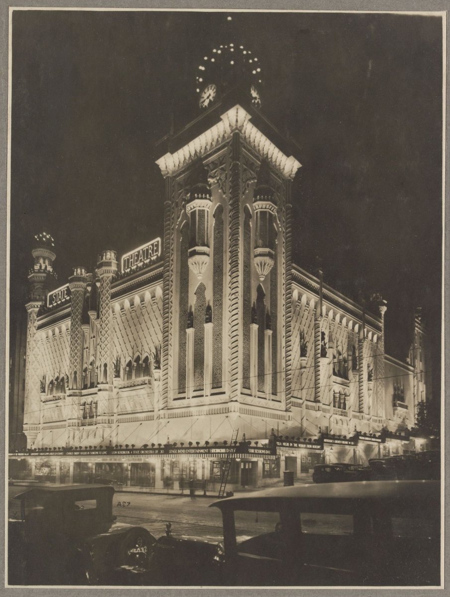 Illuminated night view of the State Theatre from the corner of Flinders and Russell Streets, Melbourne, Melbourne City (1929)