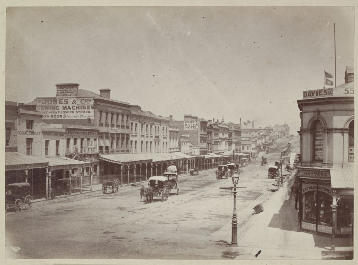 Bourke Street Melbourne, looking west from Swanston Street, showing south side of the street, Melbourne City (c. 1880)