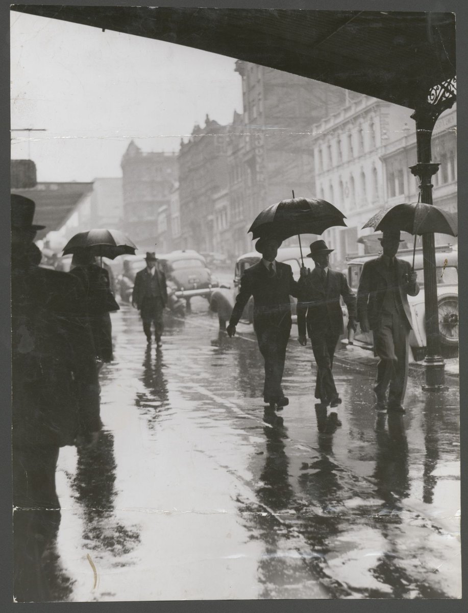 Wet weather in Bourke Street, Melbourne City (1944)