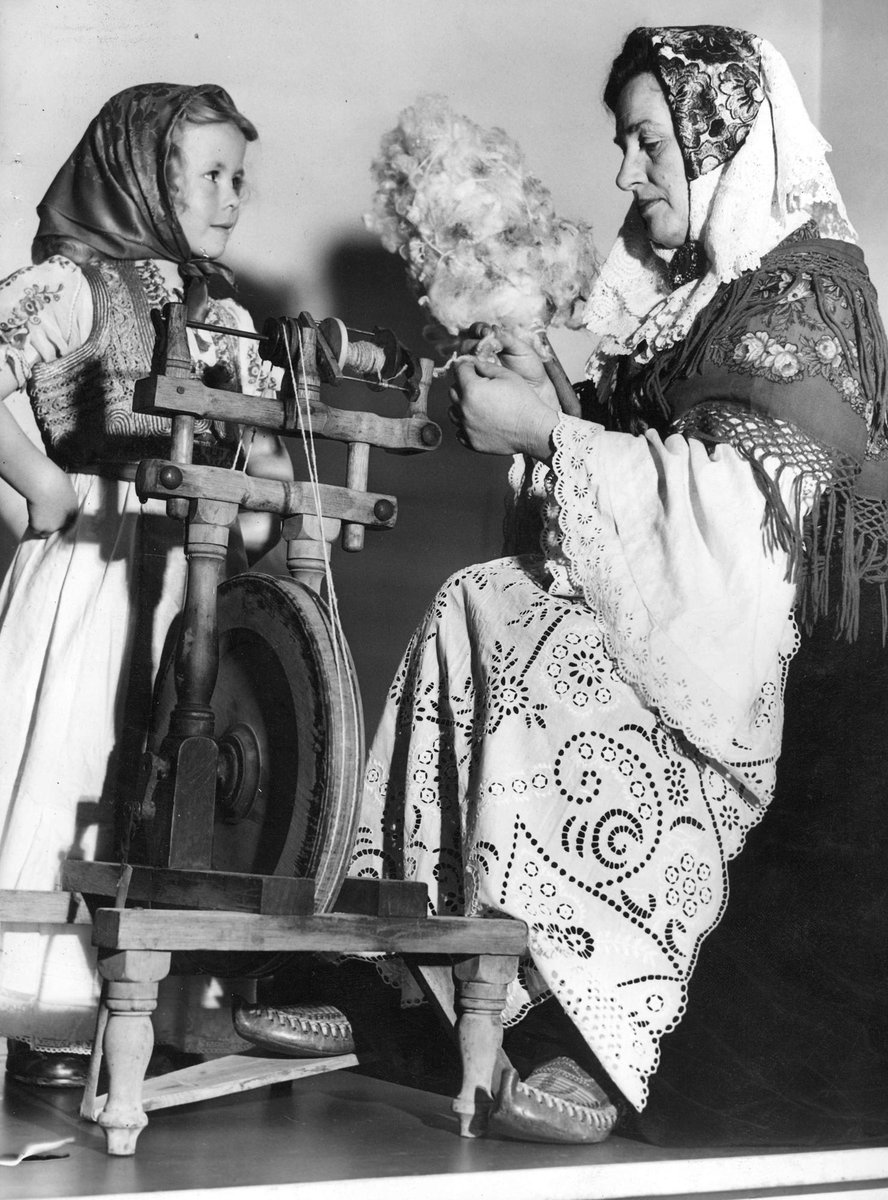 Mrs. W. H. Downing and Avril Searle in Yugoslav dress during a cooking display at the Melbourne Town Hall, Melbourne City (1941–47)