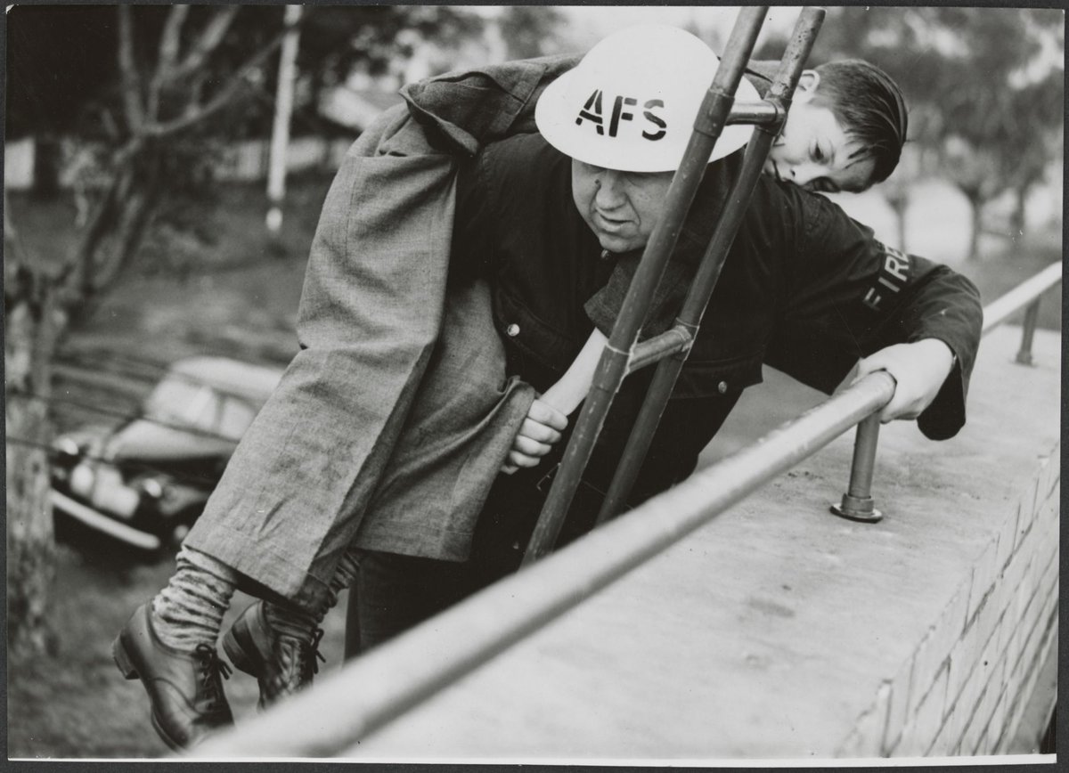 Fireman R. Kinsey of the Auxiliary Fire Service (Brighton) training in rescue (c. 1942)