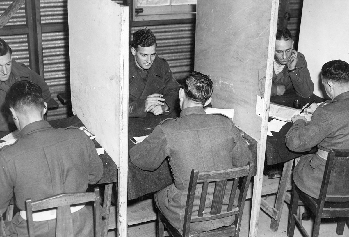 Men being interviewed at rehabilitation Section G.D.D. Royal Park Camp, Parkville (c. 1945)