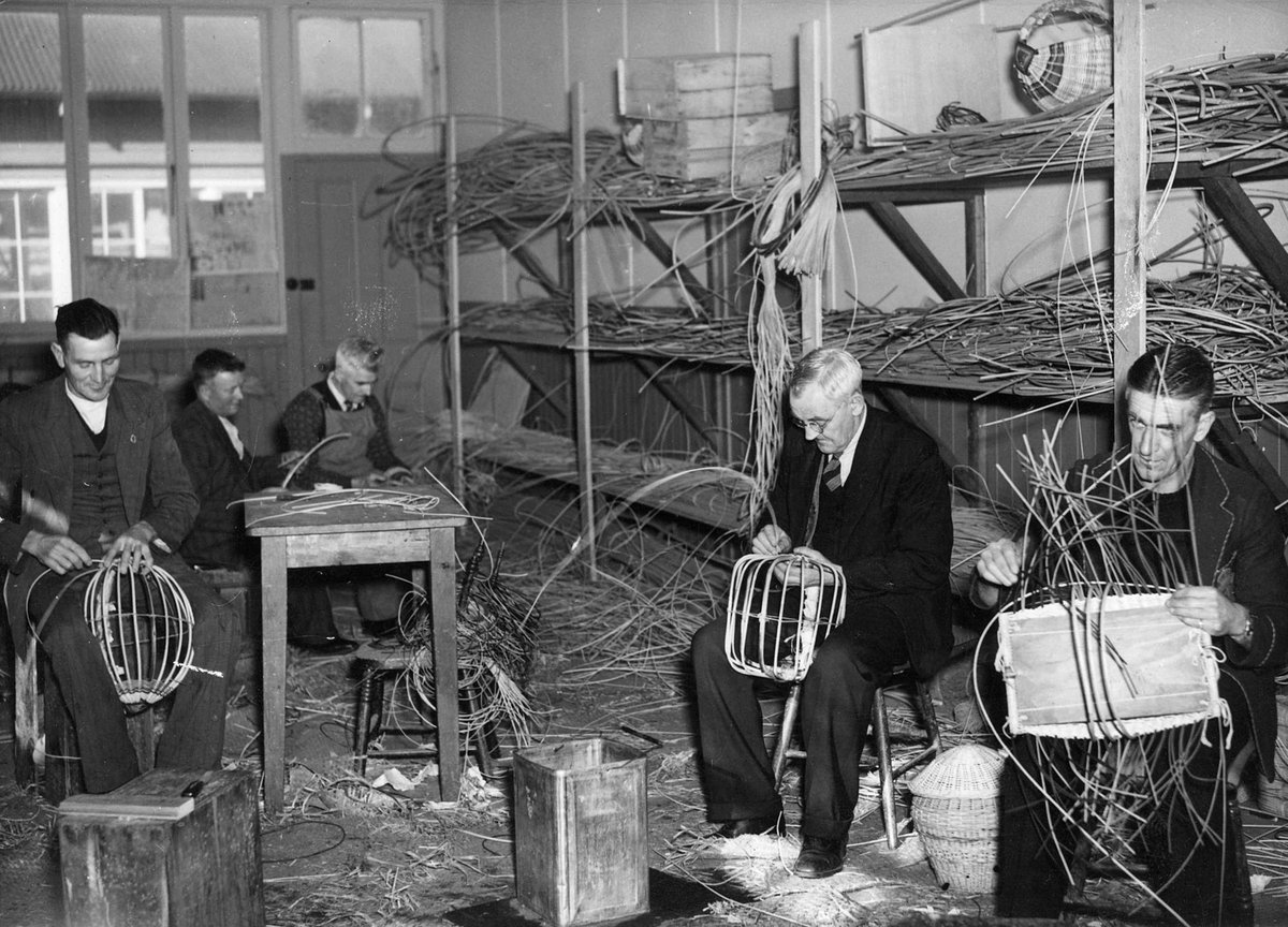 Invalid soldiers making baskets in the wicker-work room of the woodcraft section at Caulfield Military Hospital (c. 1942)