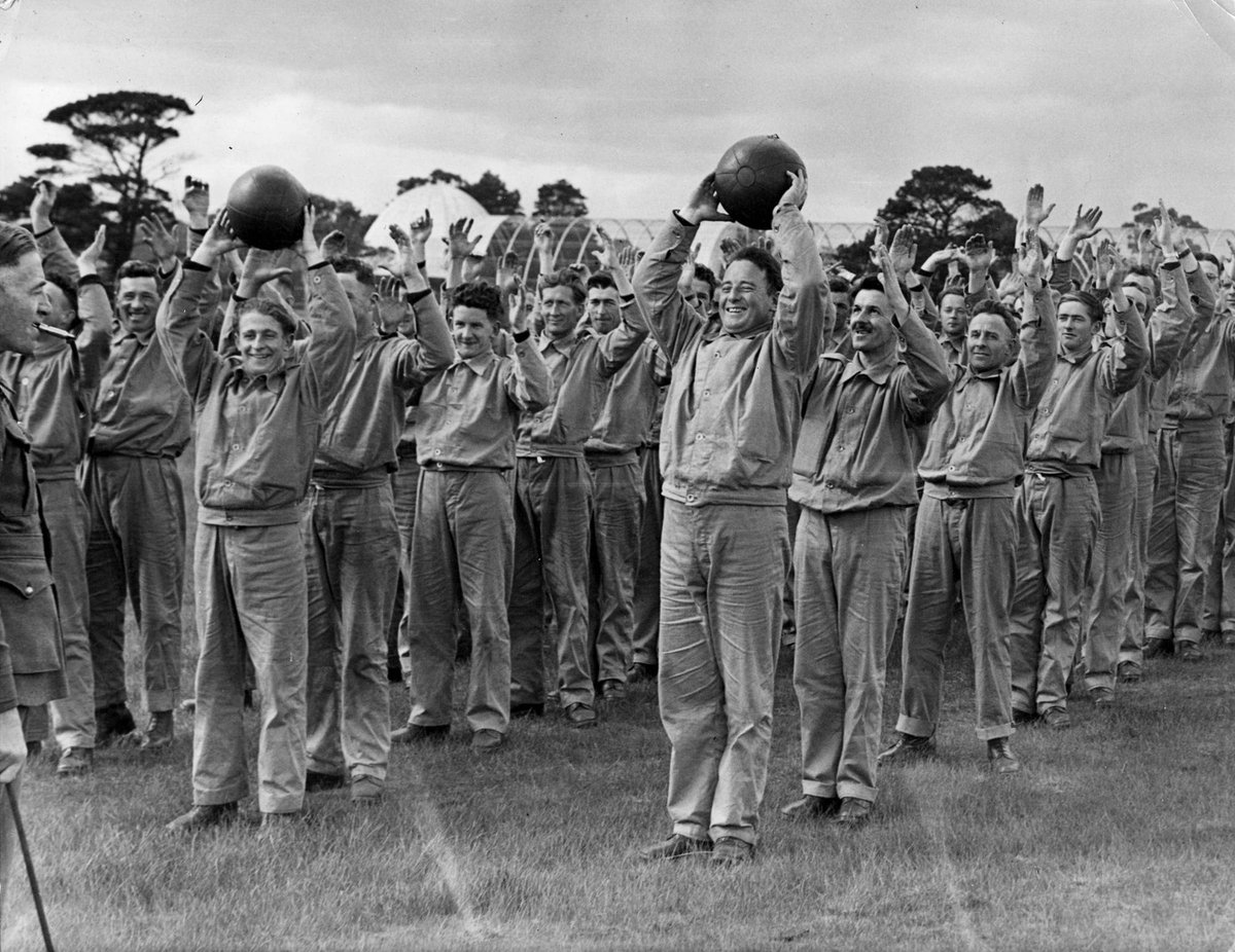Medicine ball keep these lads amused and fit at Royal Park, Parkville (c. 1940)