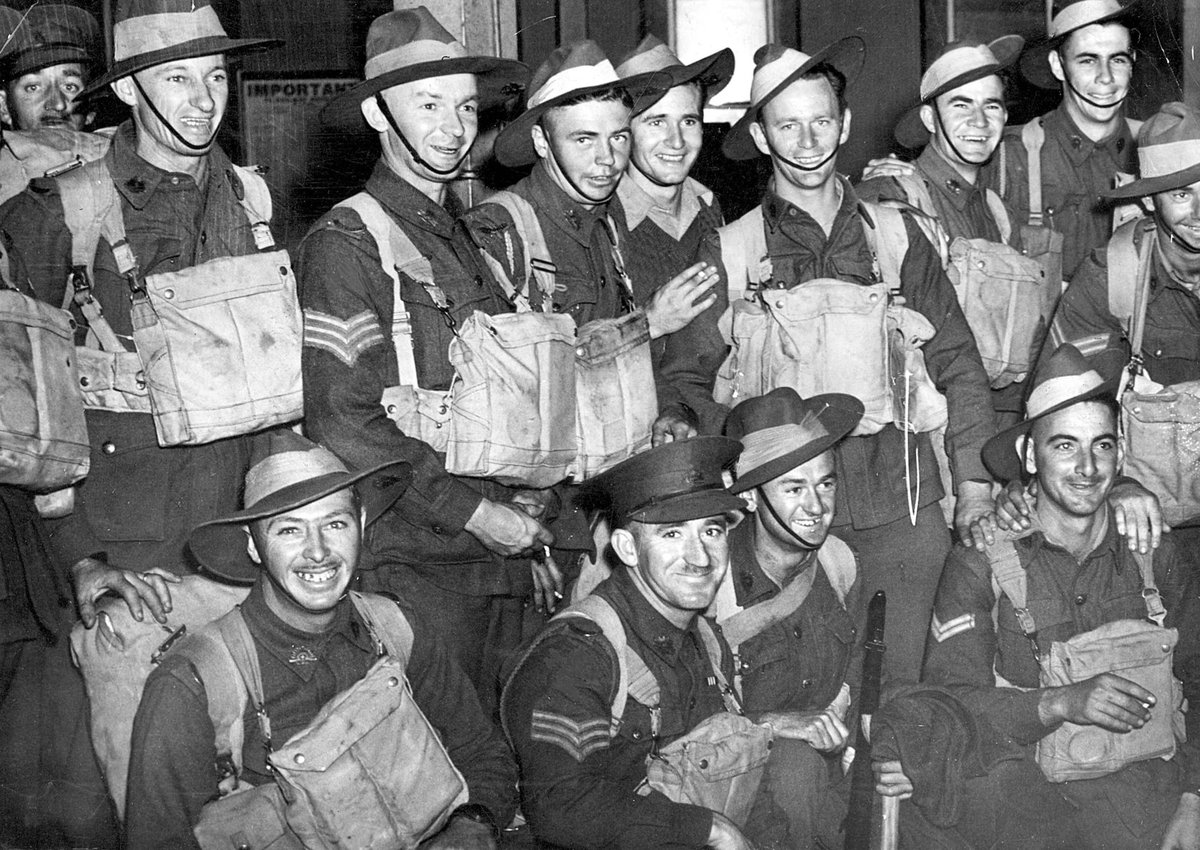 Happy A.I.F. back from abroad photographed at Spencer St. Station today, Melbourne City (c. 1942)