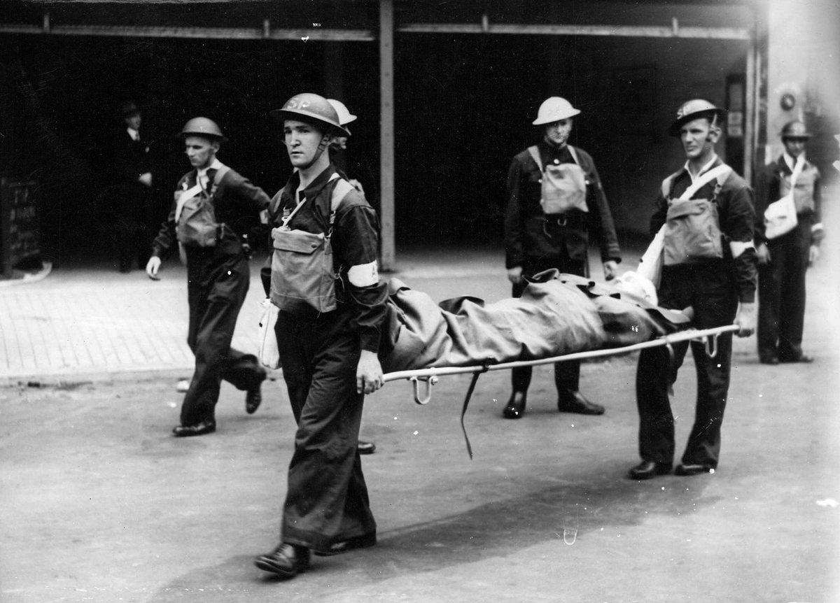 Stretcher bearers at work during A.R.P. [i.e. Air Raid Precautions] display Melbourne (c. 1943)