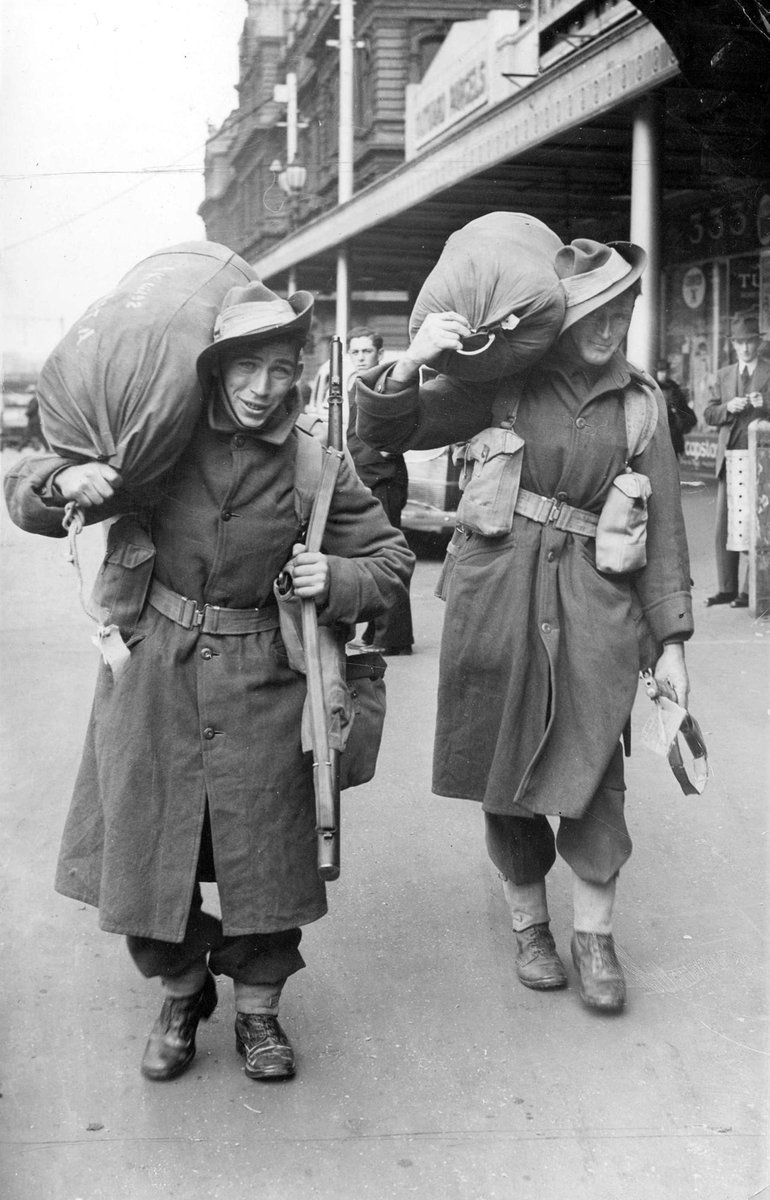 Back from the Middle East leaving Spencer Street station after their arrival here yesterday, Melbourne City (c. 1942)