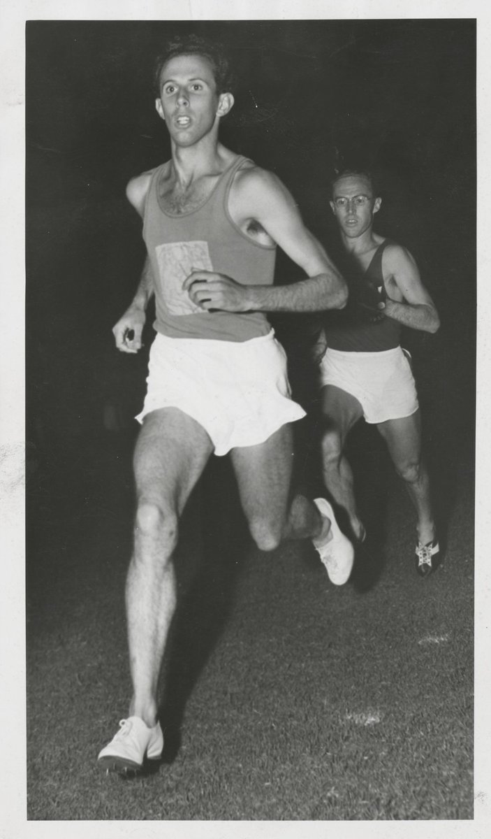 John Landy (Geelong Guild) leading the field in the first lap of the Men's Invitation 1500 meters event - Amateur athletic meeting at Malvern [Vic.] (c. 1953)