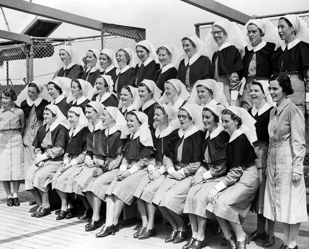 Large party of nurses leaving with the troops during embarkation at Port Melbourne (1941)