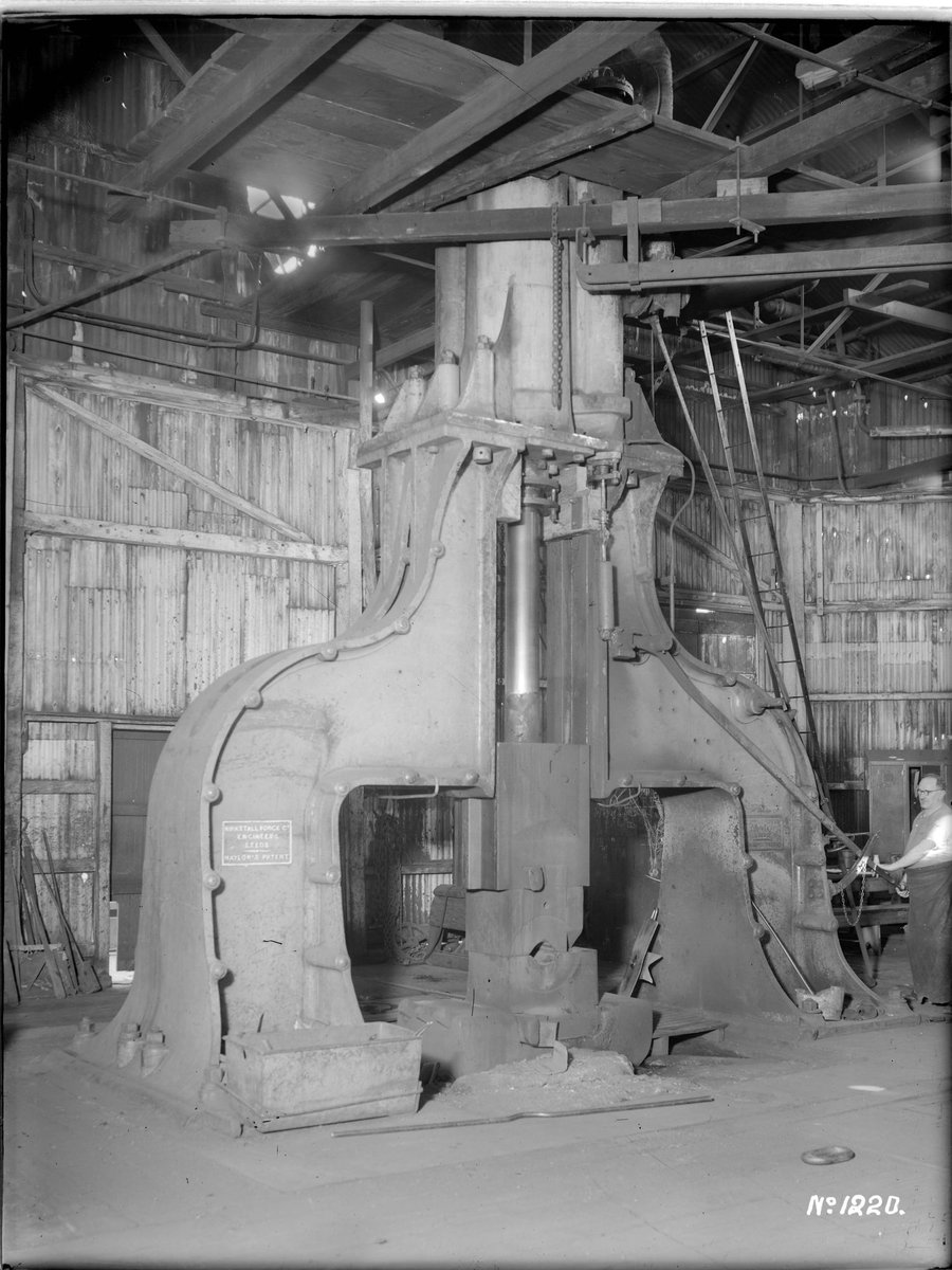 Man operating a large Naylor's Patent steam hammer made by Kirkstall Forge Co. Engineers, Leeds UK, possibly at Marfleet and Weight P/L or at the Newport Railway Workshops (1941–46)