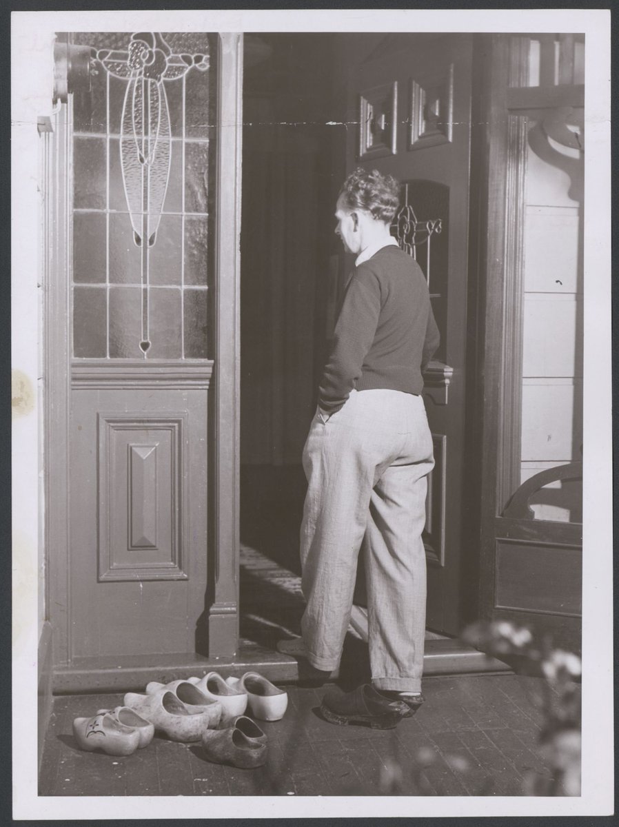 Clogs are left outside the hostel at W/town [Williamstown] by the crew of Beverwyk, a dredge working at Port Melbourne (1952)