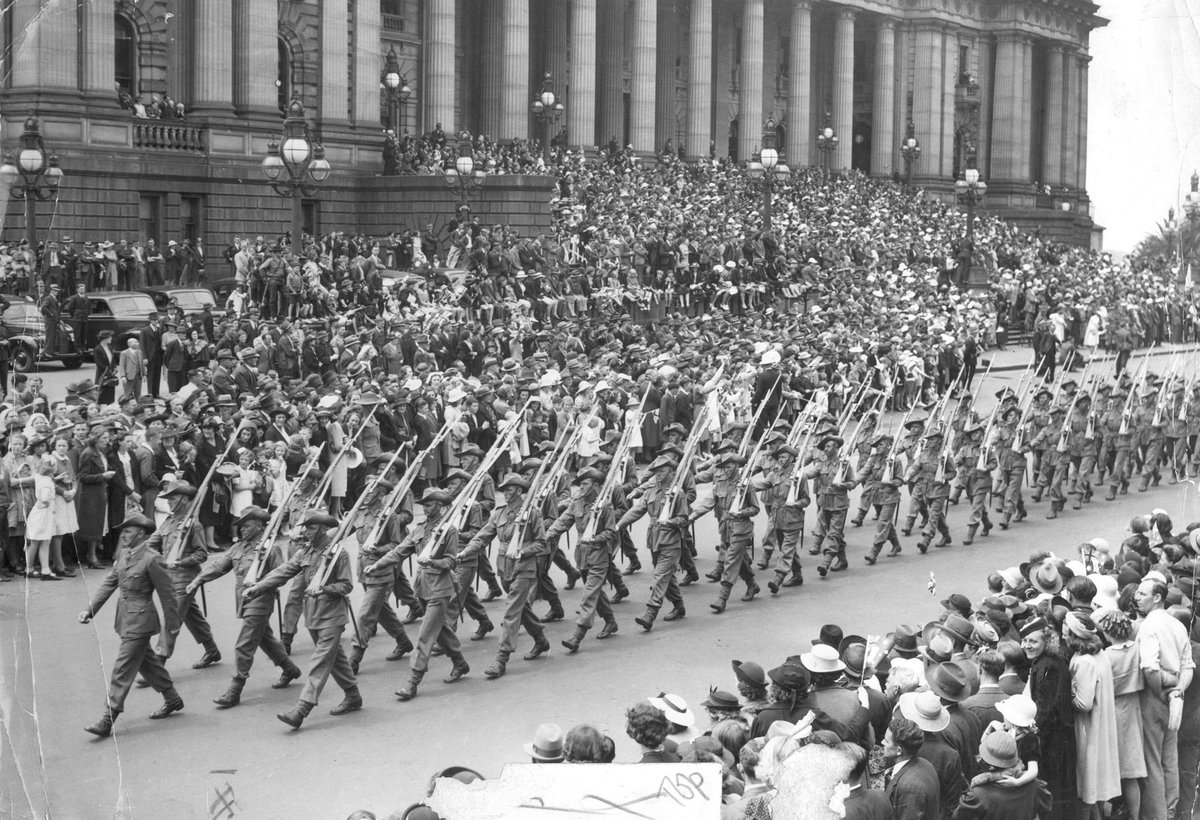 Military procession in Melbourne, near the corner of Elizabeth and Collins Streets, 1943, Melbourne City (1940)
