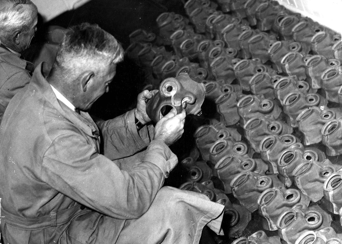 Examiners at work on Thousands of Gas Masks at the Commonwealth Laboratories at Maribyrnong - Vic (c. 1938)
