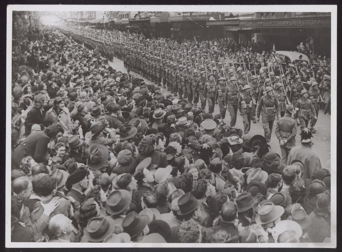 A.I.F. men marching in Bourke Street, Melbourne, Melbourne City (1942)