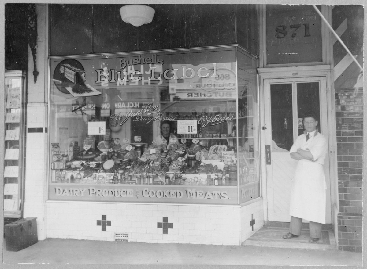 Phil Evans in front of his shop 'The Junction' dairy produce shop, 871 Sydney Road, Brunswick (1934–36)