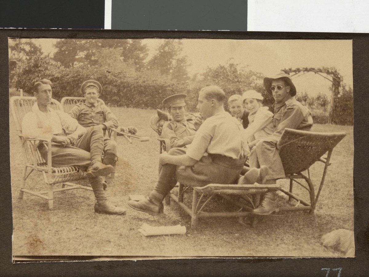 [Soldiers and nurse relaxing in cane chairs, croquet mallets on lawn behind them, Hethersett Private Repatriation Hospital, Burwood, Vic.] (1914–20)