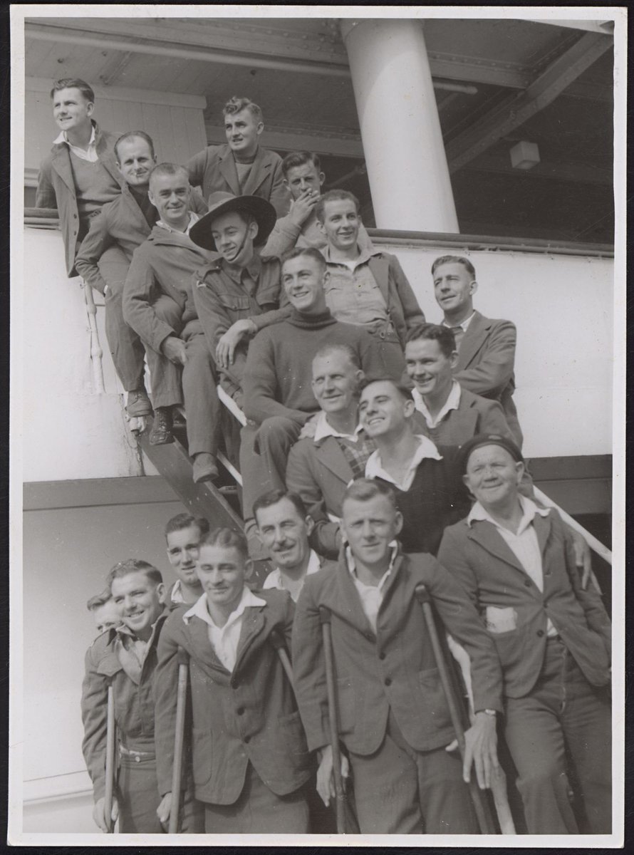 Members of the A.I.F. invalided from the Middle East, disembarking from a hospital ship, Melbourne (1942)